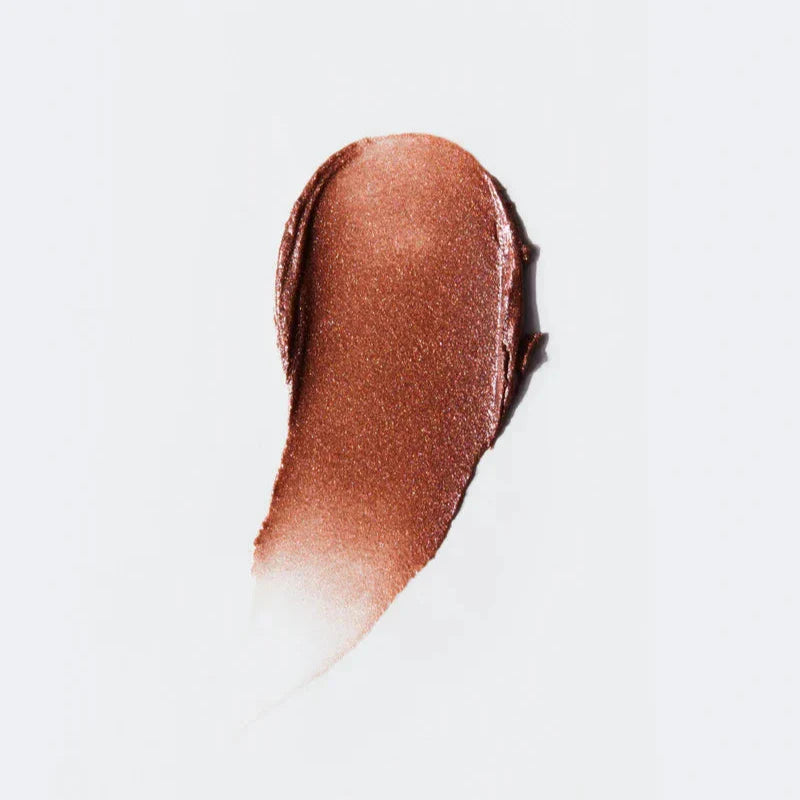 Westman Atelier Highlight Stick in rich bronze shade for a luminous glow and radiant complexion