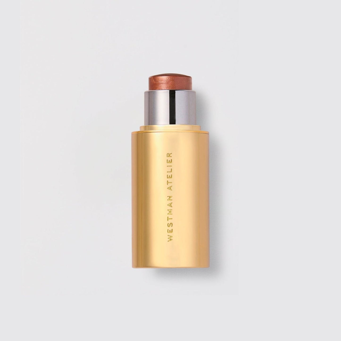 Westman Atelier Highlight Stick in a gold tube for a radiant glow and easy application