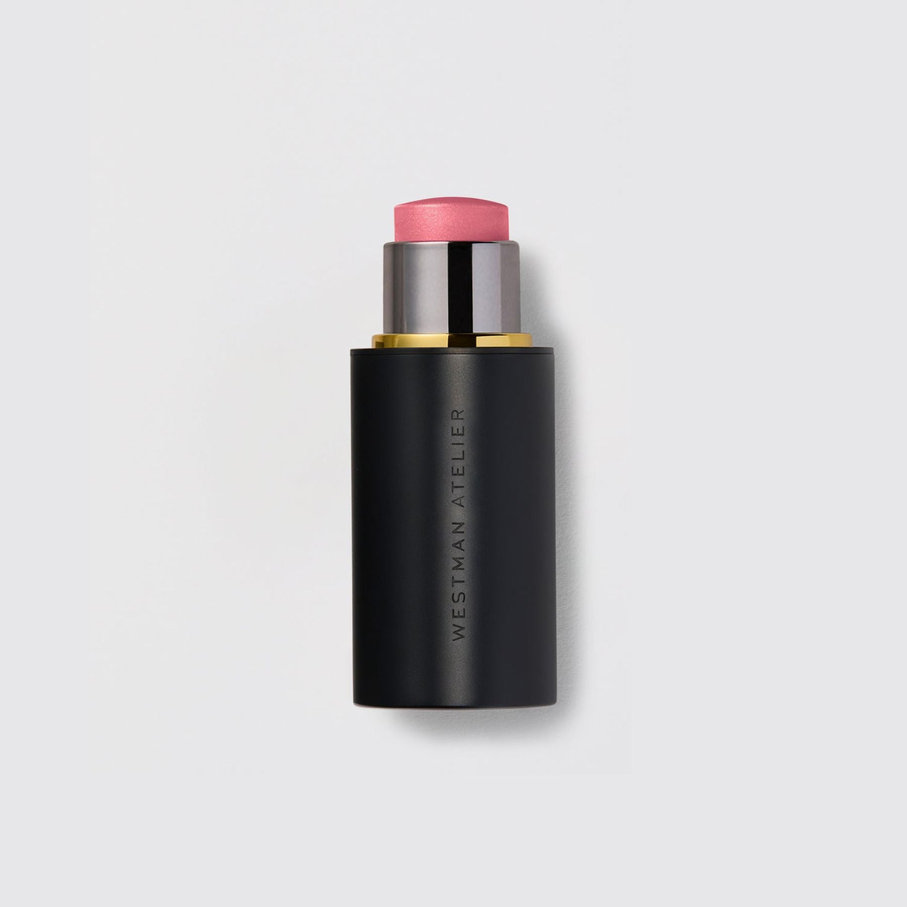 Westman Atelier Highlight Stick in Soft Pink for a Radiant Glow on Cheeks