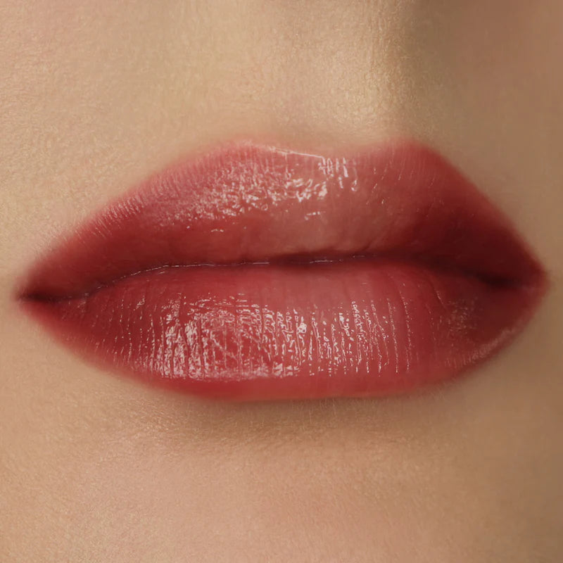 Rituel de Fille Lipstick in a rich shade providing a glossy finish on soft lips