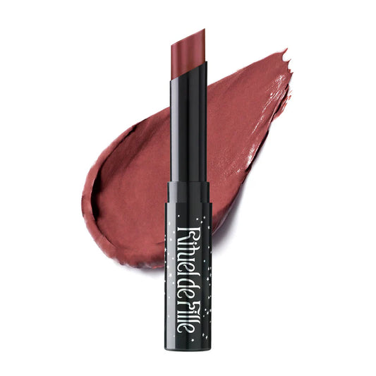 Rituel de Fille lipstick in deep berry shade for a bold and nourishing lip look