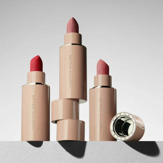 Westman Atelier Luxury Matte Lipstick in various shades displayed elegantly on a minimalistic background