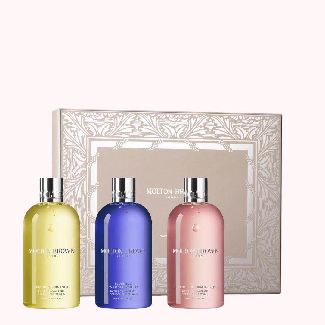 Molton Brown floral and fruity body care set with three luxurious shower gels in elegant packaging