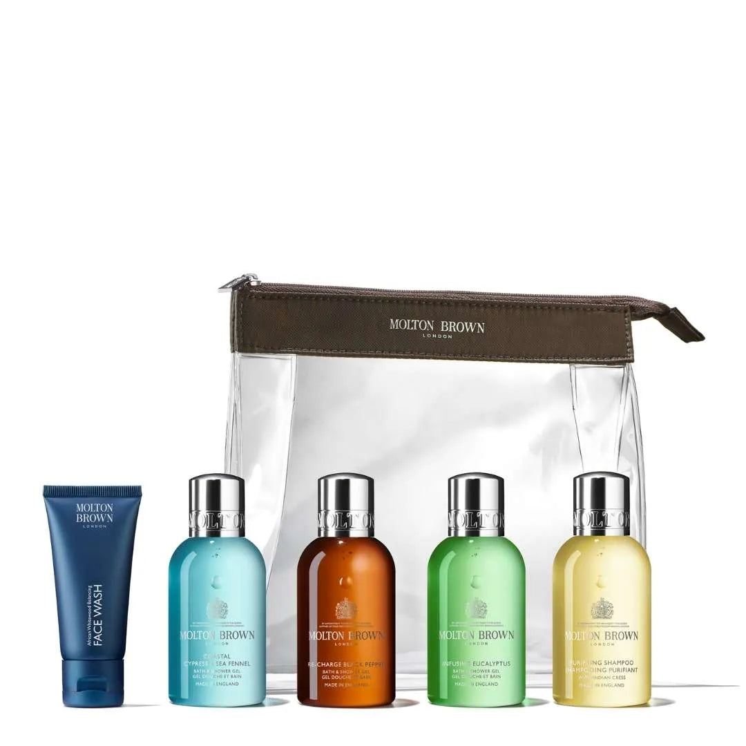 Molton Brown men's carry on toiletries set featuring travel-sized grooming products in a clear pouch