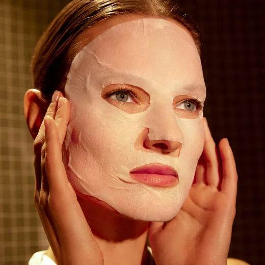 Natura Bissé Plumping And Firming Mask applied to a model's face for rejuvenating skincare