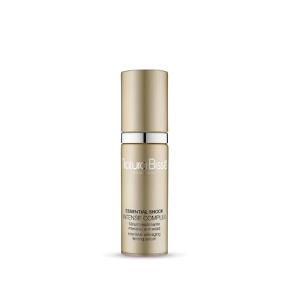 Natura Bissé Essential Shock Intense Complex Anti-Aging Firming Serum in gold bottle for smooth skin