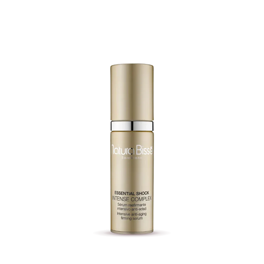 Natura Bissé Essential Shock Intense Complex Anti-Aging Firming Serum in gold bottle for smooth skin
