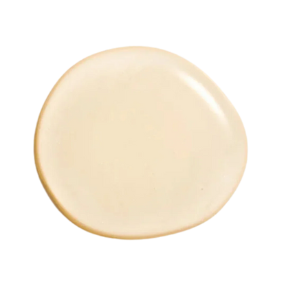 Natura Bisse Cleansing Exfoliating Gel in a smooth cream texture on a dark background