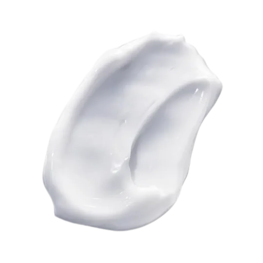 Smooth texture of Natura Bissé Comfort Creamy Cleanser on a dark background