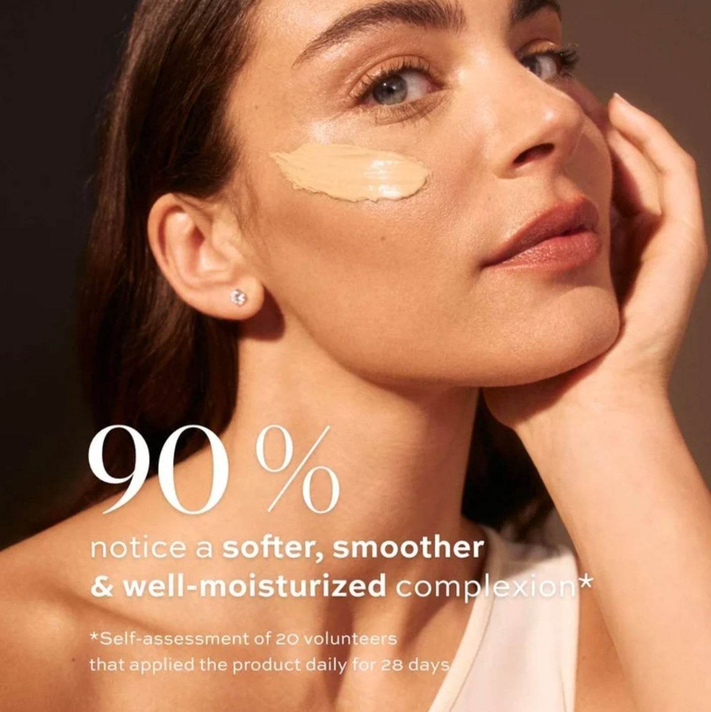 Diamond Cocoon Sheer Holiday Set featuring a model showcasing a radiant complexion with skincare product application