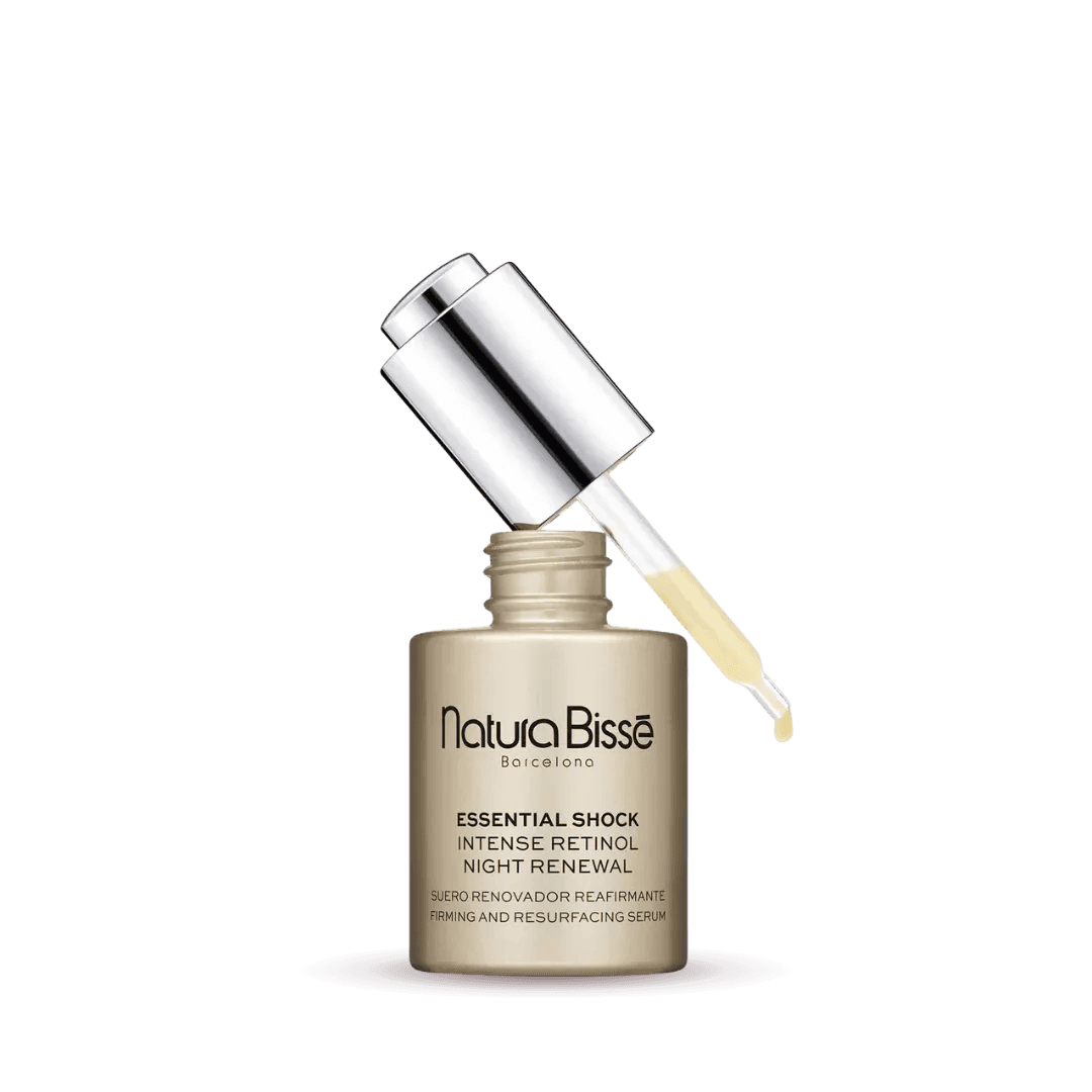 Natura Bissé Essential Shock Intense Retinol Firming And Resurfacing Serum in a sleek bottle with a dropper