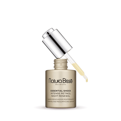 Natura Bissé Essential Shock Intense Retinol Firming And Resurfacing Serum in a sleek bottle with a dropper