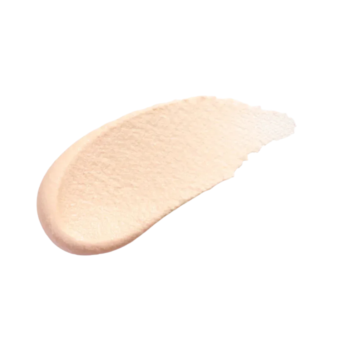 Smooth application of Natura Bissé Firming Antioxidant Mask in a light beige color