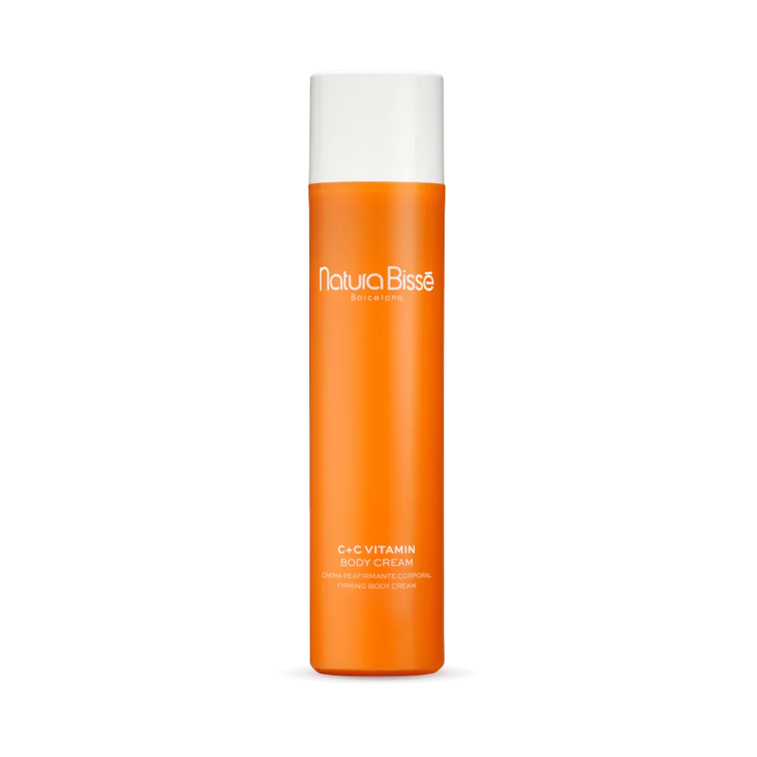 Natura Bisse C+C Vitamin Body Cream in vibrant orange packaging, promoting silky skin and hydration with firming body cream