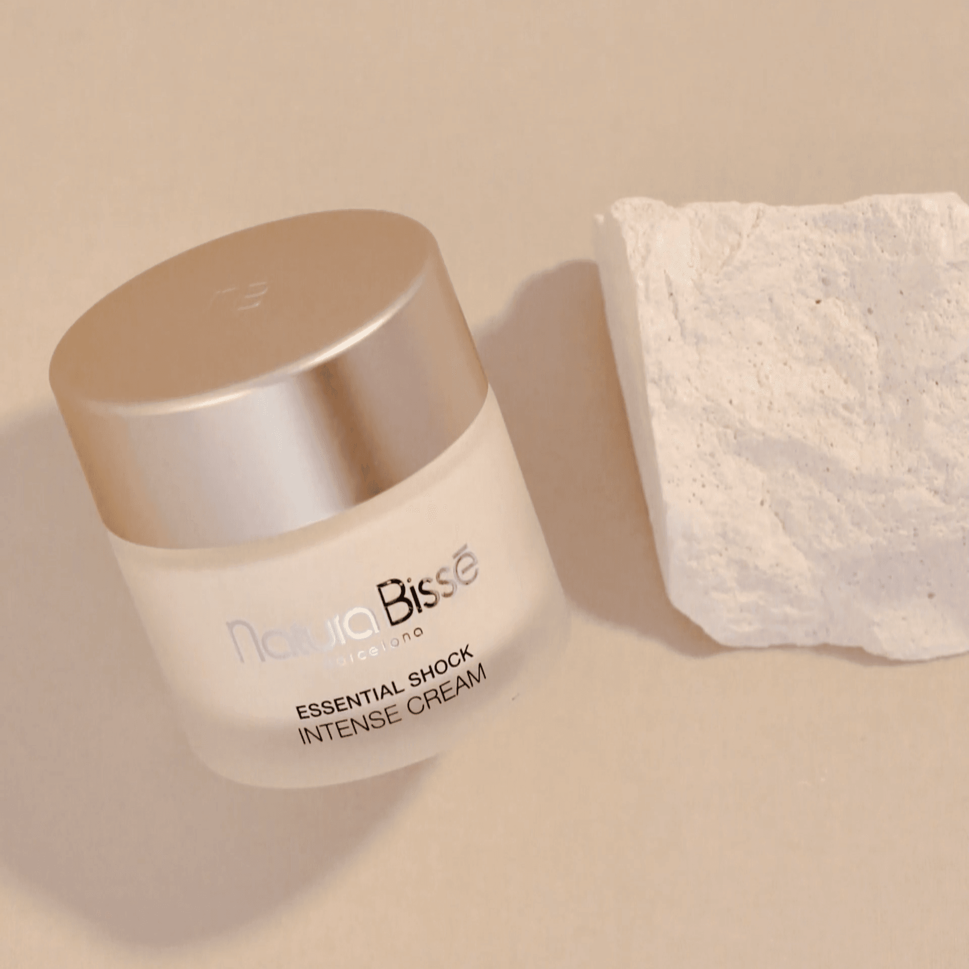 Natura Bissé Essential Shock Intense Cream, a Firming Face Cream in a sleek jar for skincare enthusiasts