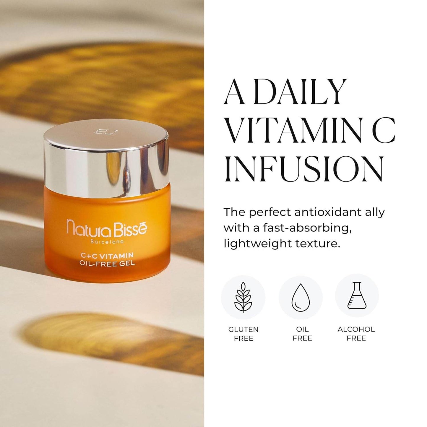 Natura Bisse Lightweight Firming Moisturizer in an orange jar with a silver lid against a blurred background