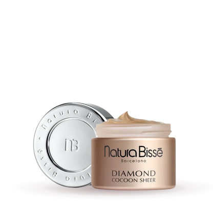 Natura Bisse Diamond Cocoon Sheer Tinted Moisturizer in a sleek jar for radiant skin