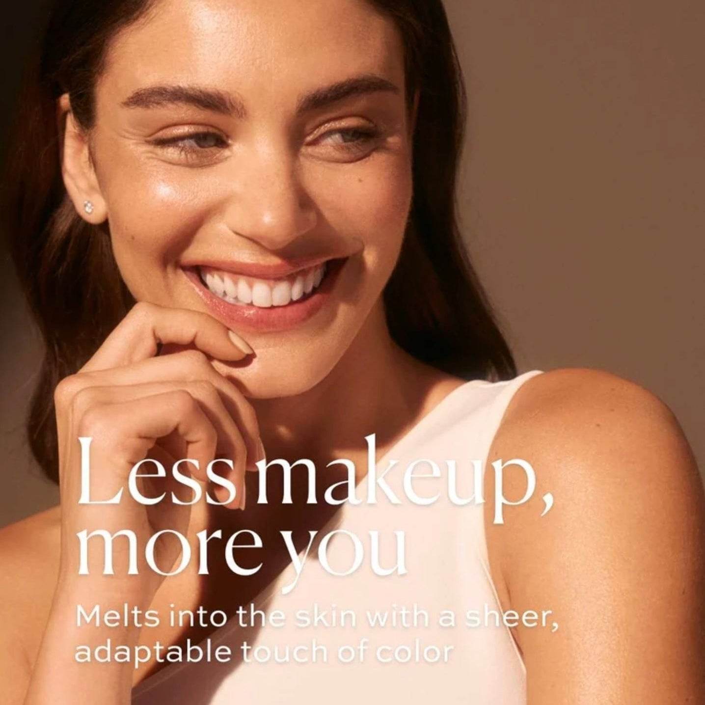 Natura Bisse Tinted Moisturizer melting into skin for a natural look with sheer color