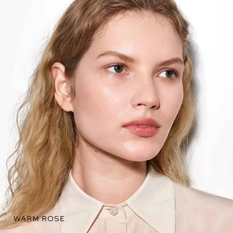 Westman Atelier Nude Lipstick Palette applied to model's lips, showcasing a natural look