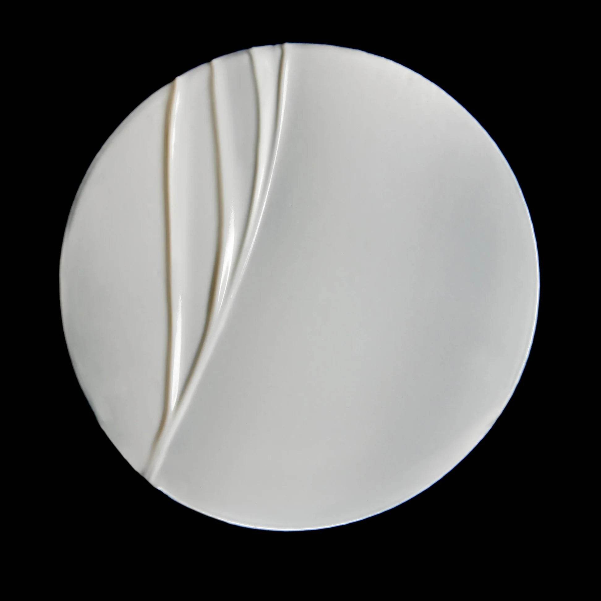 Smooth Omorovicza Barrier Cream on a white plate showcasing its creamy texture and luxurious feel