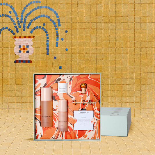 Omorovicza Daily Queen Trio set with skincare products in a colorful gift box