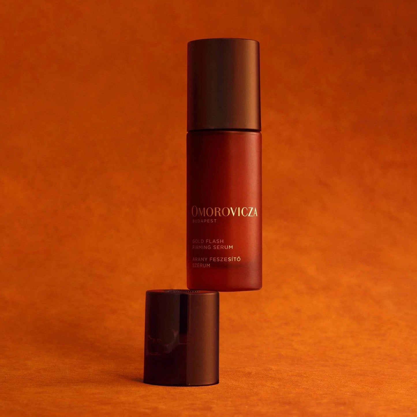 Omorovicza Gold Flash Firming Serum in a sleek bottle for rejuvenating skin appearance