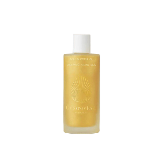 Omorovicza Gold Shimmer Oil in a sleek bottle for a luxurious glowing skin finish