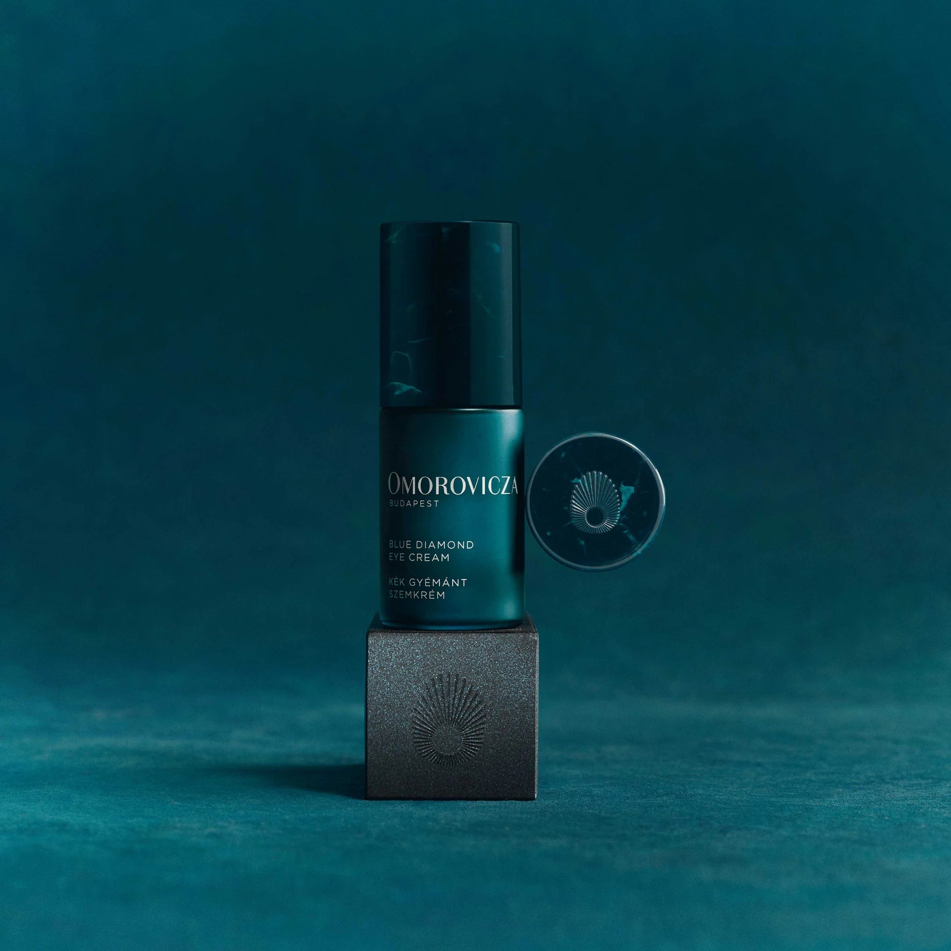 Omorovicza Blue Diamond Peptide Eye Cream in a sleek bottle for revitalizing the under-eye area