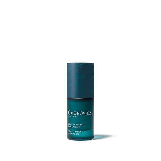 Omorovicza Blue Diamond Eye Cream in a sleek bottle, perfect for reducing dark circles with peptide eye cream