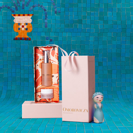 Omorovicza Perfecting Duo set featuring serum and cream in elegant packaging for skincare enthusiasts