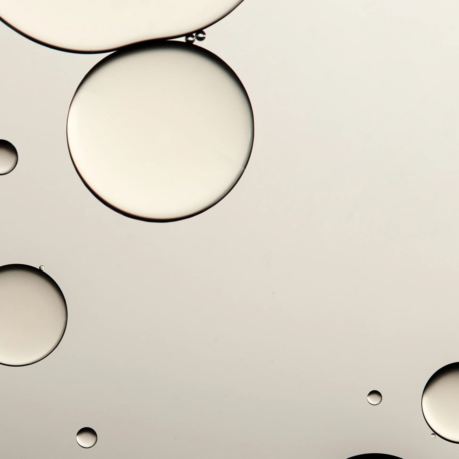 Close-up of bubbles showcasing the Omorovicza Queen of Hungary Facial Mist for a refreshing skincare experience