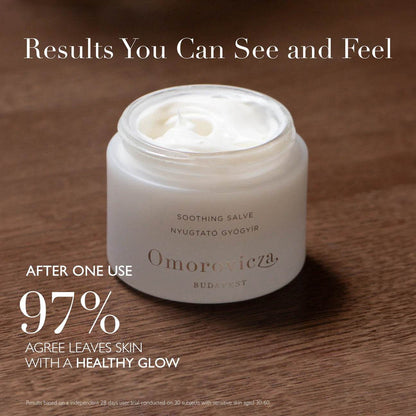 Omorovicza Soothing Salve in a jar on wooden surface promoting healthy glow after one use