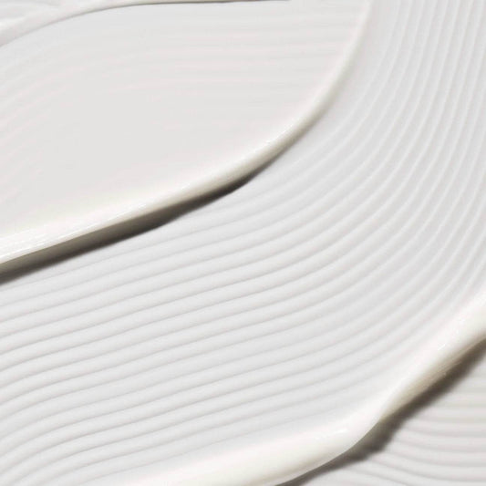 Omorovicza Soothing Salve texture featuring a smooth, creamy white formula for calming skin