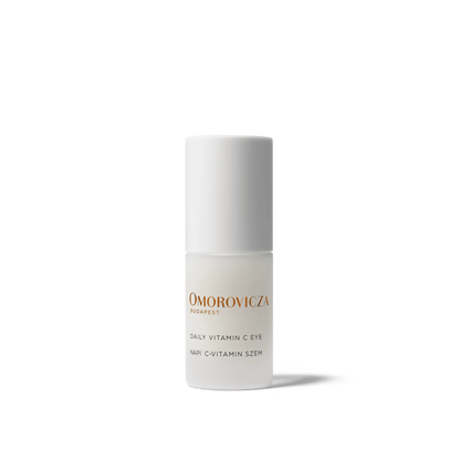 Omorovicza Vitamin C eye cream in a sleek bottle designed for brightening and nourishing the eye area