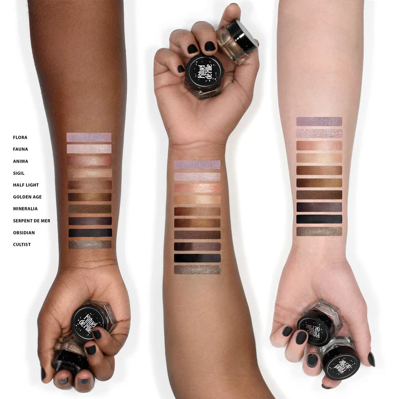 Variety of Rituel de Fille Cream Eyeshadow swatches on diverse skin tones displayed on arms