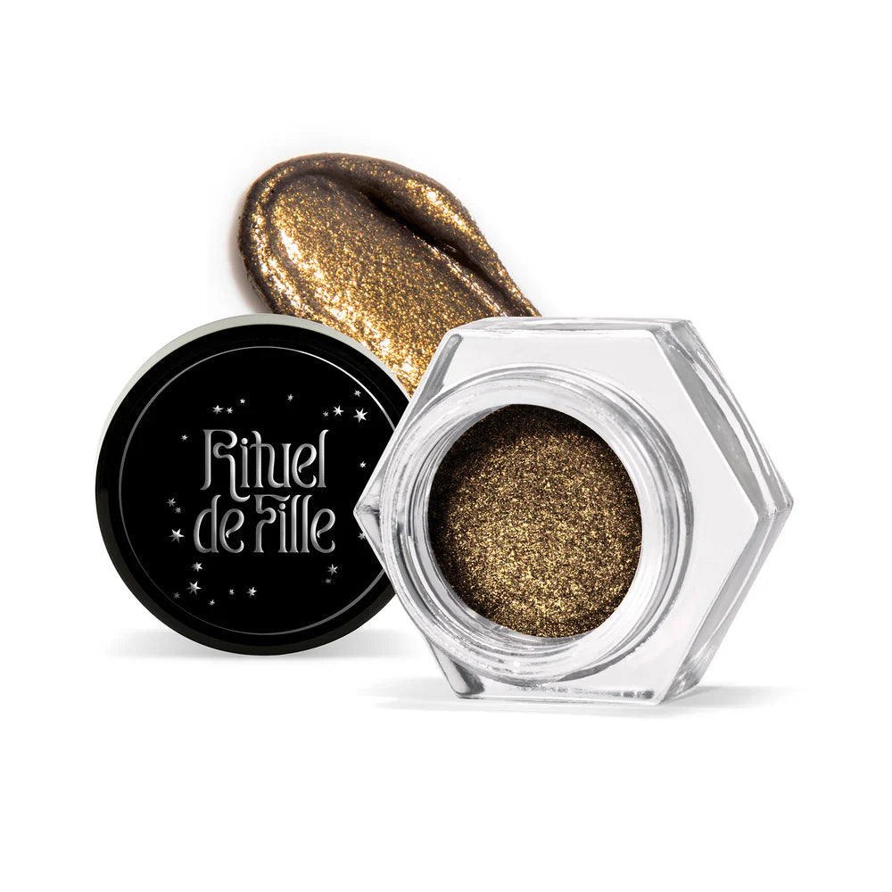 Rituel de Fille Eye Gloss in a shimmering bronze with a hexagonal jar for radiant eye looks