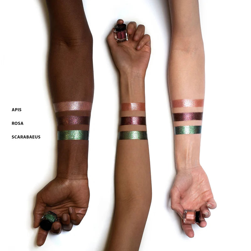 Swatches of Rituel de Fille Eye Gloss in Apis, Rosa, and Scarabaeus on various skin tones