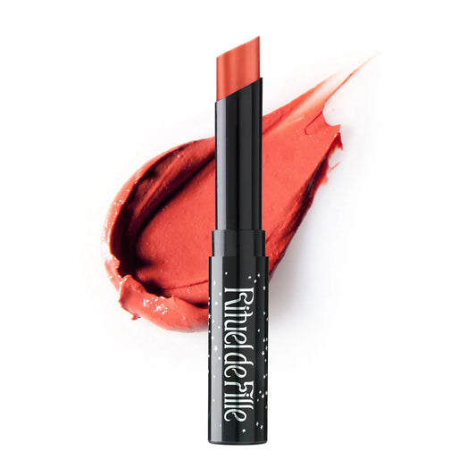 Rituel de Fille Lip Sheer in a soft coral shade with a smooth, creamy texture for effortless application