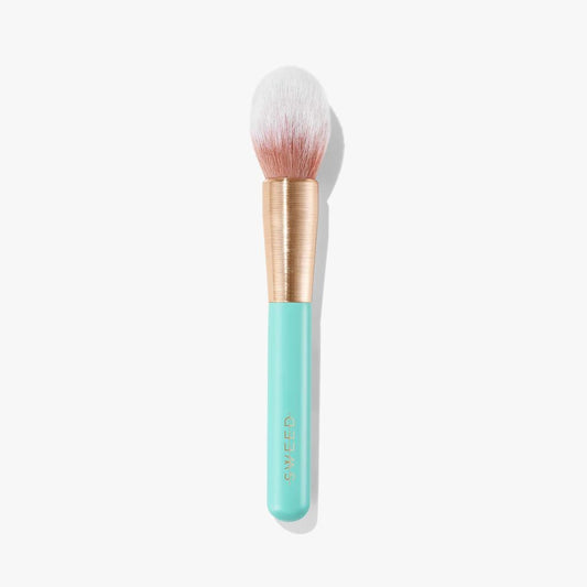 Sweed soft bristle powder brush with a mint handle and soft bristles for smooth application