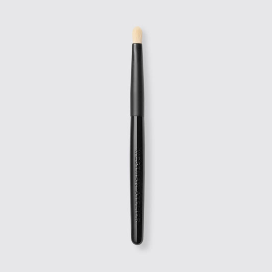 Westman Atelier Spot Concealing Brush with a tapered head for precise coverage of blemishes
