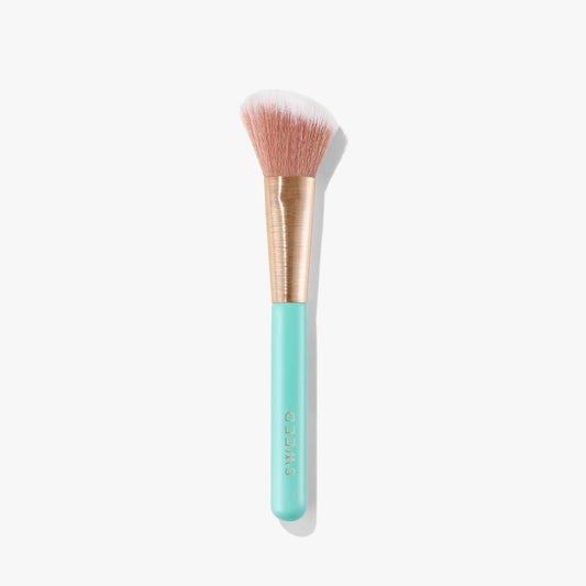 Sweed angled blush brush with a soft bristle head and a stylish mint green handle