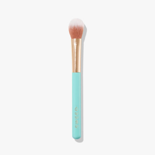 Sweed Highlighter Brush with soft bristles and a turquoise handle for precise application