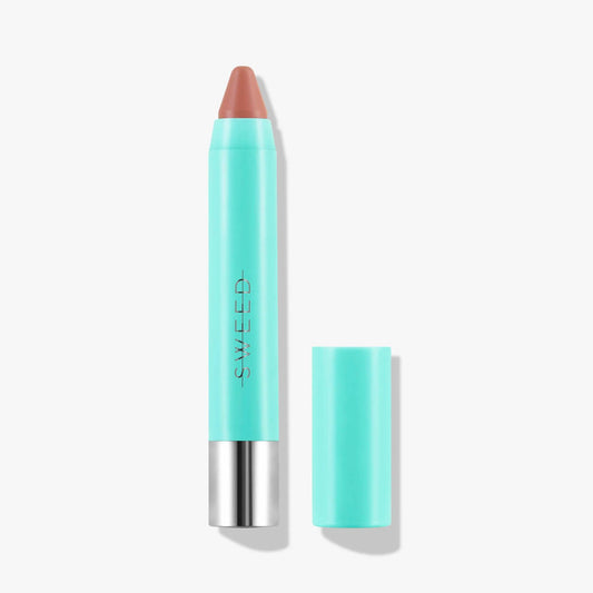 Sweed luxury lip crayon in turquoise packaging with a creamy nude shade for vibrant lips