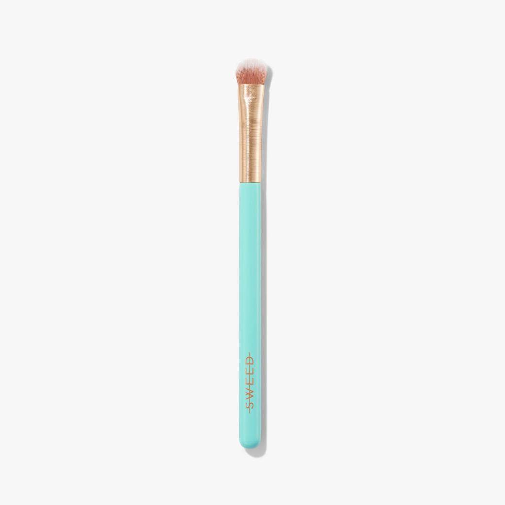 Sweed Eyeshadow Brush with a soft bristle head and a turquoise handle for precise makeup application