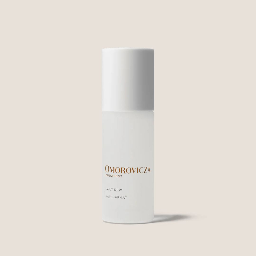 Omorovicza Daily Dew Gel Moisturizer in a sleek white bottle for hydrated, glowing skin