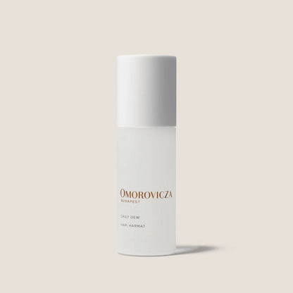 Omorovicza Daily Dew Gel Moisturizer in a sleek white bottle for hydrated, glowing skin
