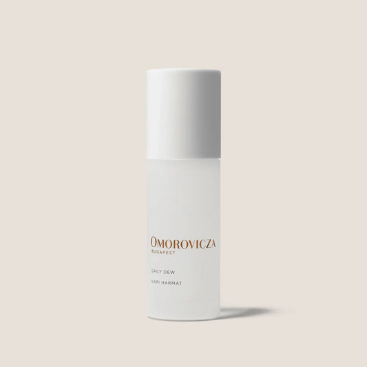 Omorovicza Daily Dew Gel Moisturizer in a sleek white bottle for hydrated, glowing skin