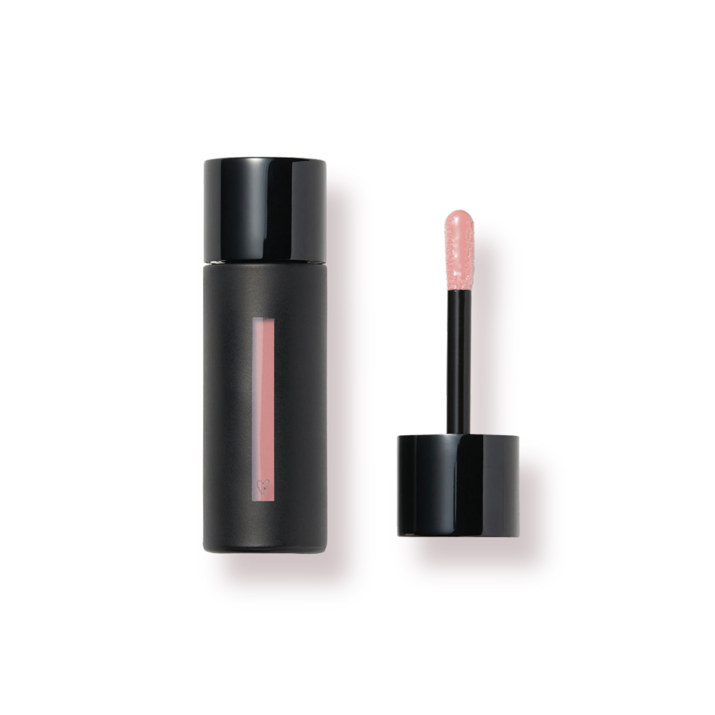 Westman Atelier Tinted Lip Balm in a sleek black tube with a doe-foot applicator for effortless application