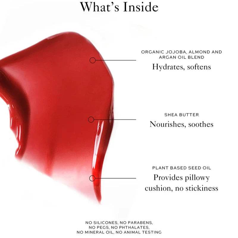 Close-up of Westman Atelier Tinted Lip Balm showing rich red color and moisturizing ingredients