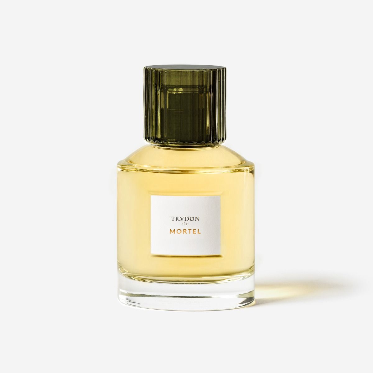 Trudon Mortel Eaux De Parfum in a stylish glass bottle with a green cap for elegant fragrance experiences